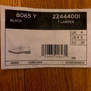 Mary Jane. Dr. Martens. All black.